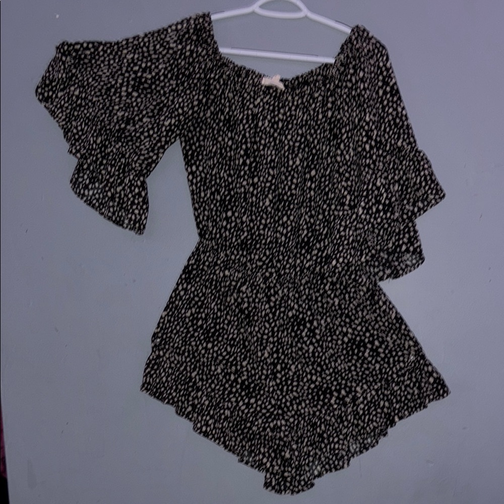 Eesome Black and White Asymmetrical Ruffled Blouse
